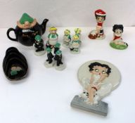 A Wade Andy Capp teapot, toast rack, Salt and Flo Pepper, three further Andy Capp figures and