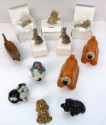 A Collection of Wade figures including No.1 Dougal, five dogs, two rabbits, a black and white cat,