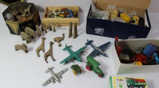 A collection of Dinky toys including lorries, cars, aeroplanes, etc, together with carved Noah`s Ark