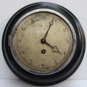A B.R.W No.4355 Railway wall clock, the 15cm silvered dial with Arabic numerals inscribed Elliott