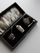 An Edward VIII silver three piece cruet set of tapering square form, Birmingham, 1936,