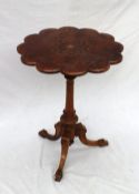 A Victorian burr walnut wine table with a lobed inlaid top on a turned column and tripod base, 52cm