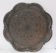 An Indian silver plated on copper tray of lobed circular form, the edge pierced with peacocks,