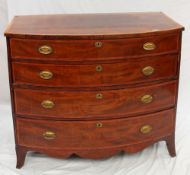 A 19th century mahogany chest, the cross banded top above four long drawers on splayed bracket