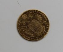 An Austro-Hungarian gold four Ducat coin