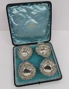 A set of four late Victorian silver Bon Bon dishes, of pointed form with a pierced edge decorated
