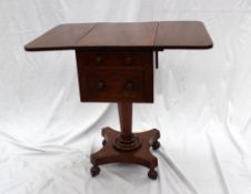 A Victorian mahogany work table, the rectangular top with drop flaps above a pair of drawers and