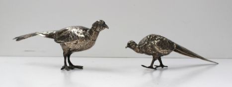 A pair of late Victorian silver models of pheasants, Sheffield, 1899, R.H.H, approximately 344