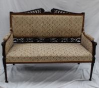 An Edwardian mahogany and satinwood cross banded two seater settee, with an upholstered arms, back