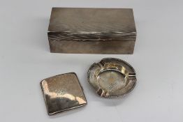 A George VI silver cigarette box of rectangular form, with engine turned decoration, Birmingham,