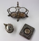 A late Victorian silver stand, with twin compartments on leaf feet, Sheffield, 1899, James Dixon