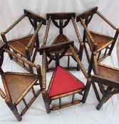 A set of six Arts and Crafts style oak turners chairs, with a line decorated back, bobbin turned