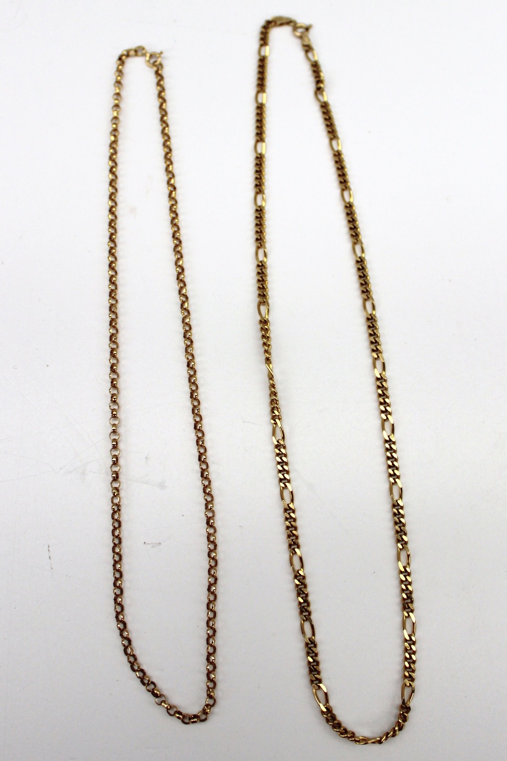 A 9ct yellow gold chain, with circular and oval faceted links, together with another 9ct yellow