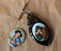 A pair of oval porcelain plaques painted with figures, one mounted as a pendant, 4cm x 3cm