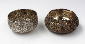 An Indian white metal bowl embossed with palm trees and leaves, 9.5cm diameter, approximately 123