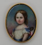 19th Century Continental School Head and shoulders portrait of a young girl An oval miniature