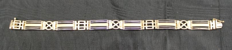 A yellow and white metal bracelet indistinctly marked but possibly 585,  approximately 24 grams