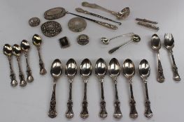 An early Victorian Albert Pattern silver sifting spoon, fork, six tea spoons and four coffee