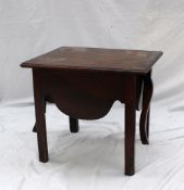 A George III mahogany night table, the rectangular hinged top with integral hinged arms, above a