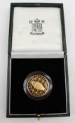 An Elizabeth II  gold proof two pound coin, dated 1999, cased