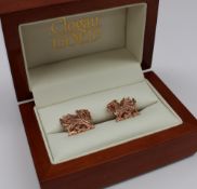 A pair of 9ct Clogau Welsh gold cufflinks in the form of Welsh dragons, with a diamond inset,