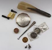 A Stratton compact, together with a shoe horn, coins etc