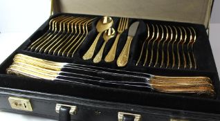 A Solingen gold plated flatware service in a leather case