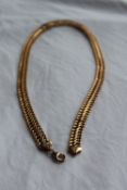 A 9ct yellow gold necklace with figure of eight links, approximately 10 grams