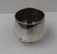 A George V silver basin of tapering form on a pedestal foot, Sheffield, 1912, approx 237 grams.