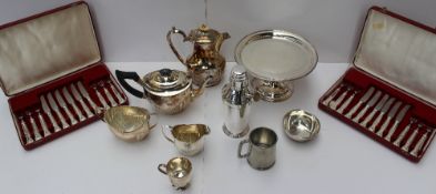 An electroplated four piece tea set together with cased flatware services, tazza, cocktail shaker