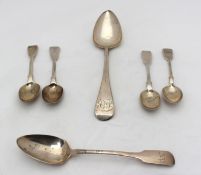 A George III silver table spoon, London, 1814, together with five other assorted silver spoons,
