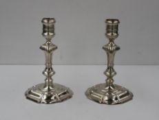 A pair of Elizabeth II silver candlesticks of square lobed form, London, 1973, Asprey, 16.5cm