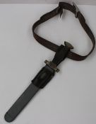 Third Reich Red Cross man's dagger, blade marked "GES. GESCHUTZT", with scabbard and leather belt