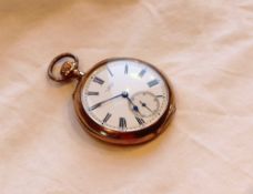 A yellow metal keyless wound open faced pocket watch the enamel dial with Roman numerals and a