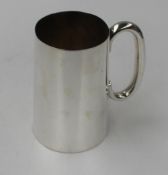 A George V Silver tankard of tapering cylindrical form, Sheffield, 1911, Walker and Hall, Approx 365