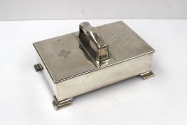 A George V silver double ended cigarette box of  rectangular form, inscribed "Presented to Rees