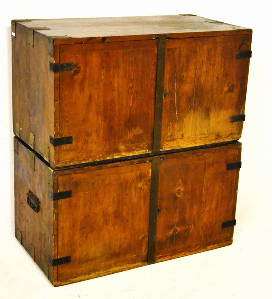 A PAIR OF 19TH CENTURY OREGON MILITARY CAMPAIGN CUPBOARDS bound with brass strapping, one with