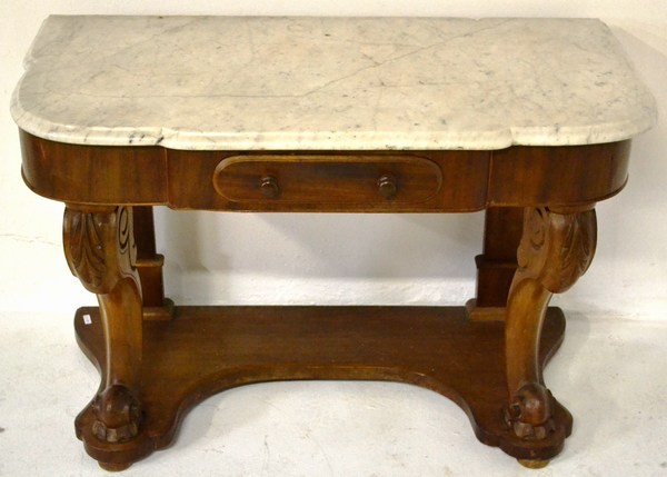 A VICTORIAN MAHOGANY HALL TABLE the serpentine shaped moulded antico blanc marble top above a shaped