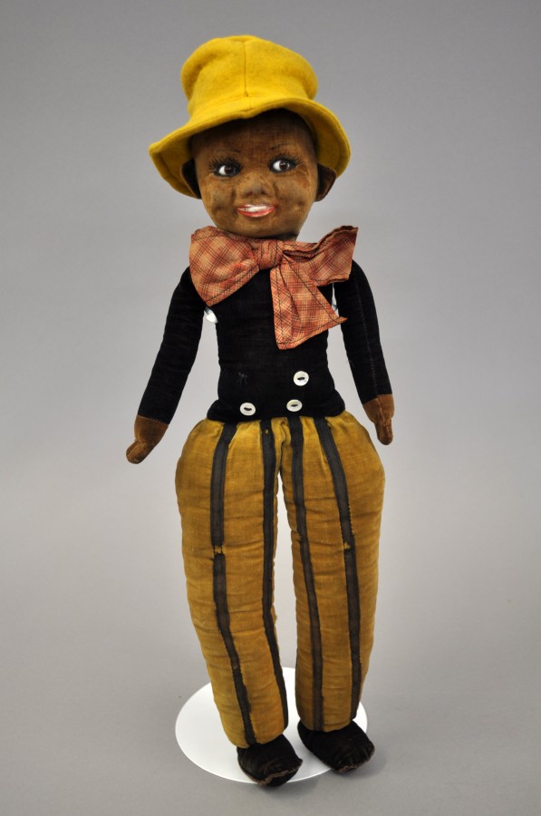 Norah Wellings felt Character Doll, c.1930`s: black doll with side glancing brown glass eyes,