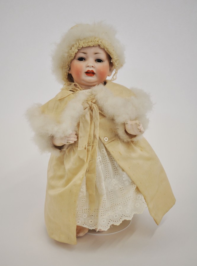 An early 20th Century German bisque head baby doll by Kestner or Hertel Schwabb. With sleeping brown