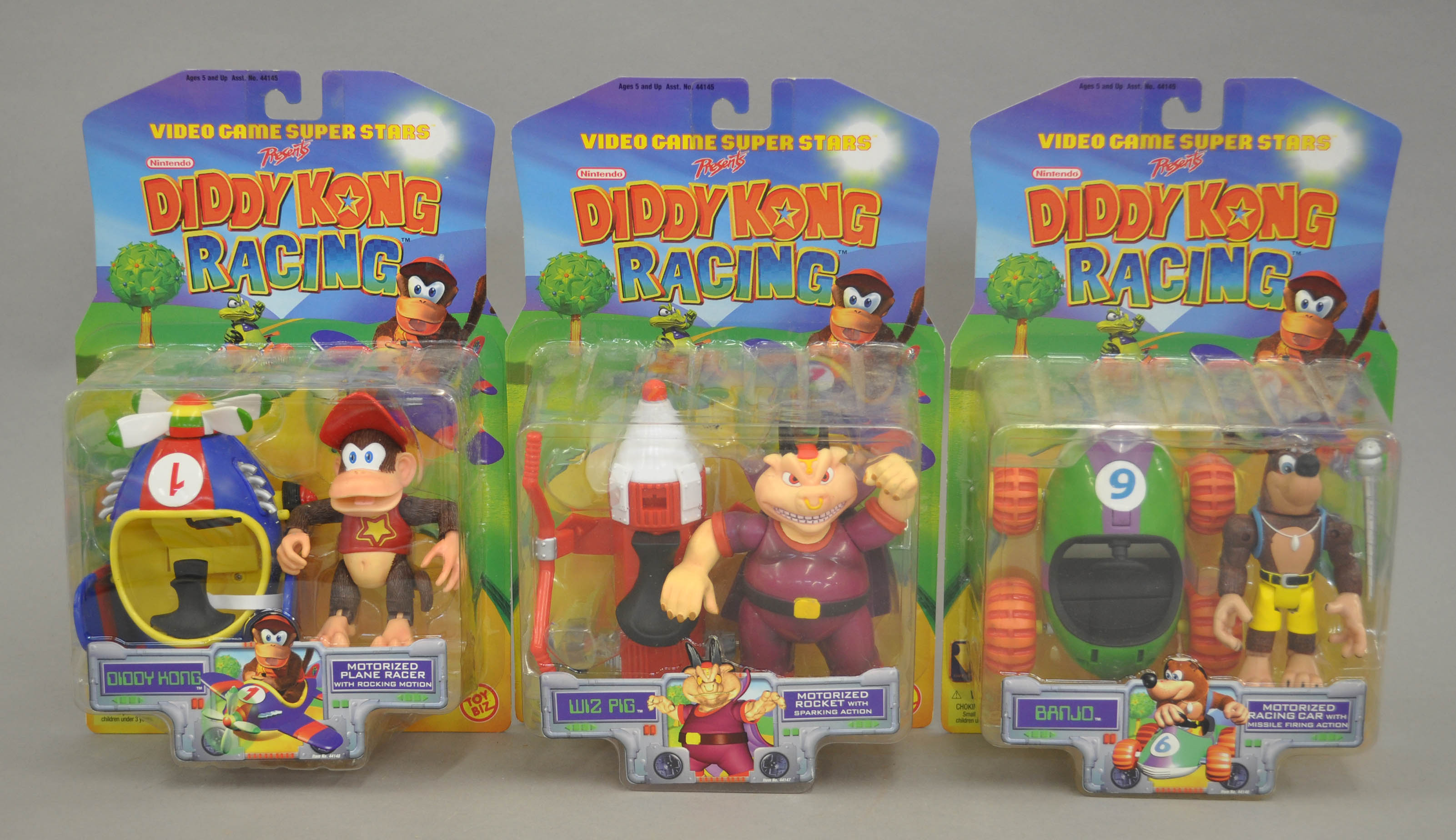 Complete set of three Toy Biz Video Game Super Stars Diddy Kong Racing action figures: Wiz Pig;
