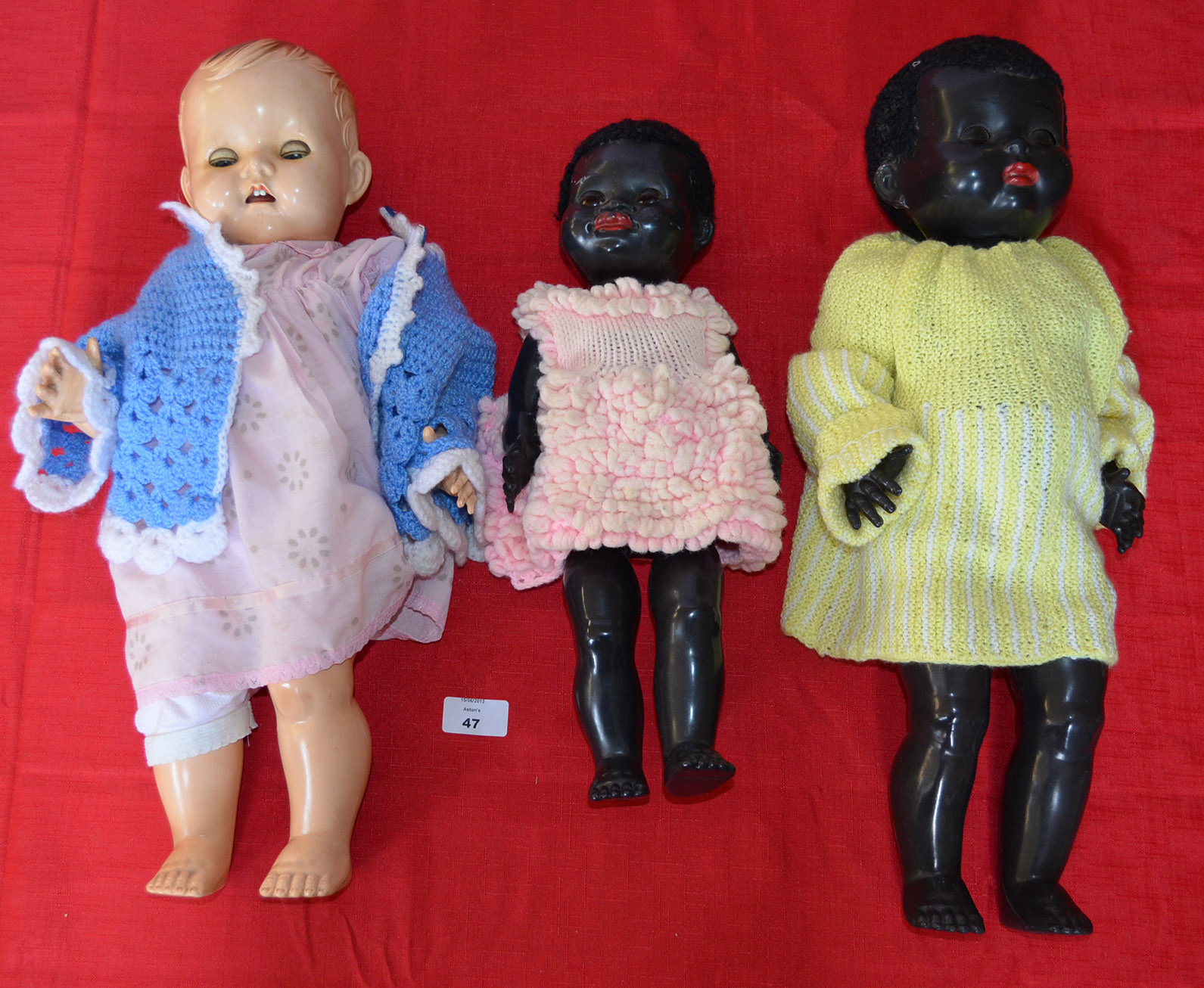 Two Pedigree black Walking Dolls, hard plastic with astrakhan wigs, flirty eyes, inoperative voice