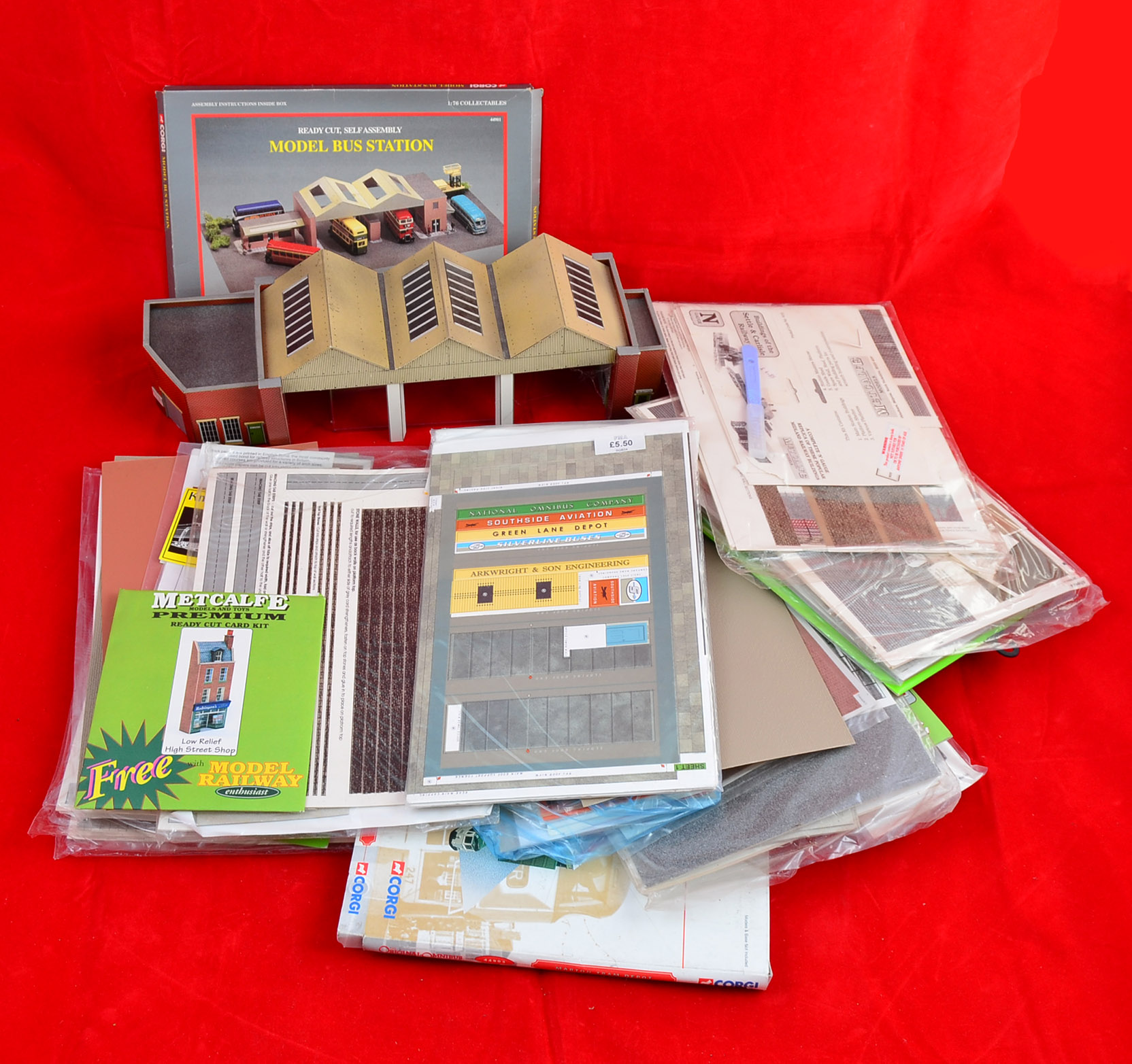 OO gauge, quantity of card buildings, signs, accessories, etc. Conditions vary.