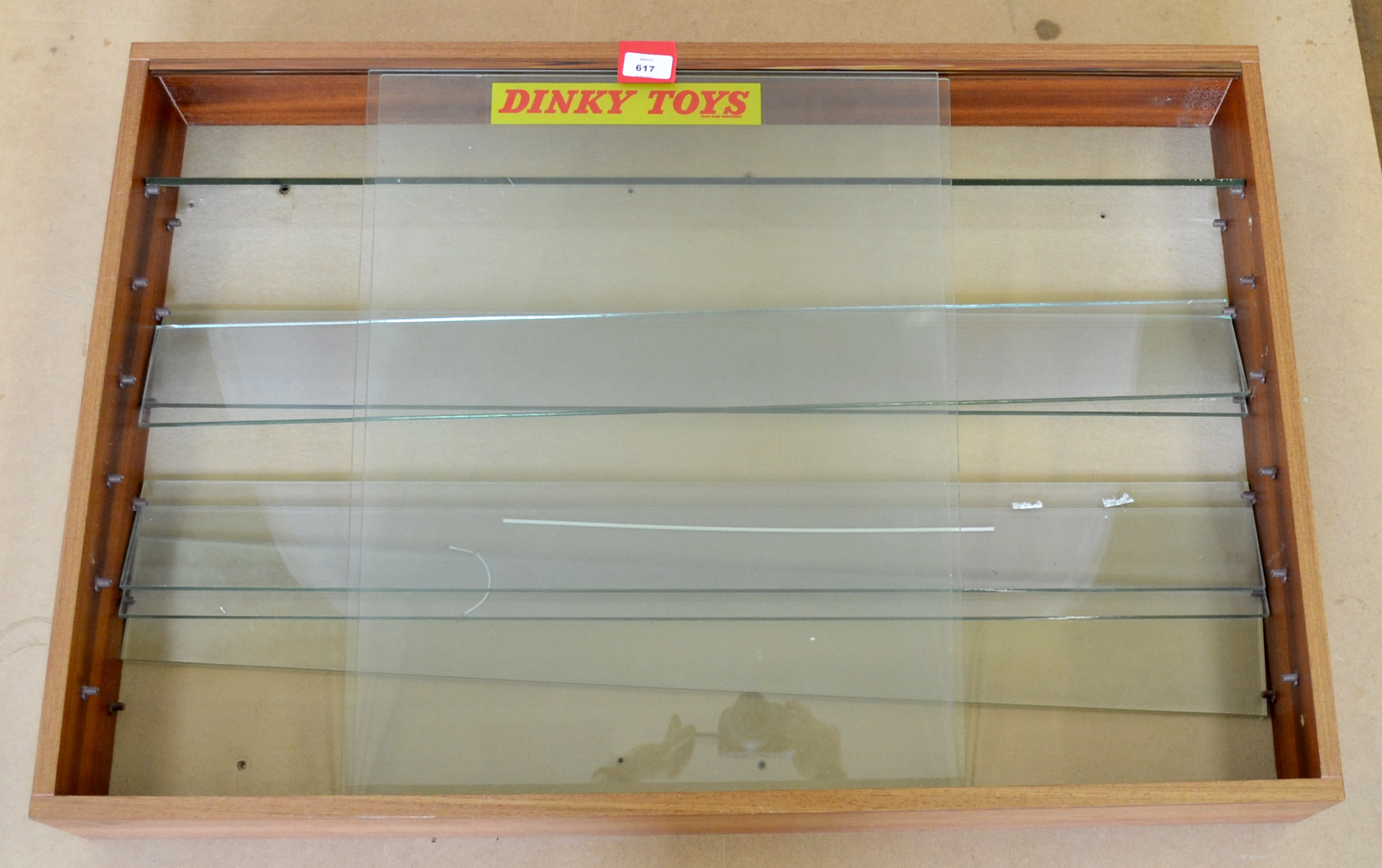 Two wooden display cabinets with sliding glass windows, both with six glass shelves and dimensions