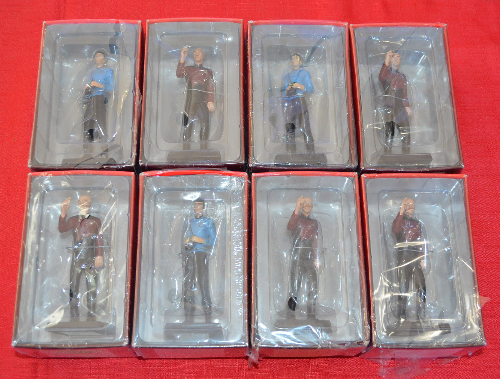 Eight G.E. Fabbri Ltd. Star Trek Deep Space Nine figures: 5 x Captain Kirk; 3 x Spock. Boxed and