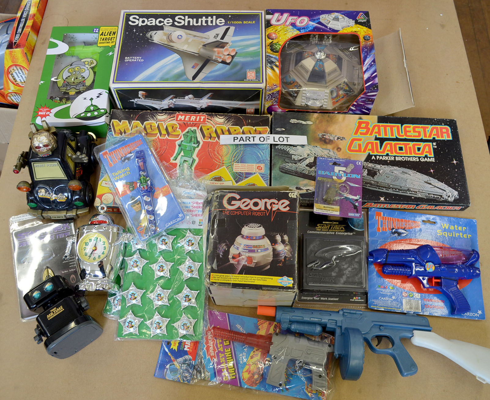 Good quantity of assorted toys, mostly robots, includes: Kuang Wu Robot Police; Tomy Mr Time;