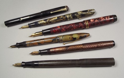 PENS
A Conway Stewart Duro No.20, a marbled Eagle pen & four other fountain pens.