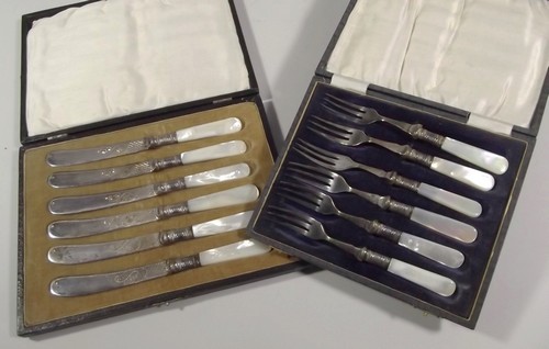 TEA KNIVES ETC.
A set of six EPNS & mother of pearl tea knives & a similar set of six dessert