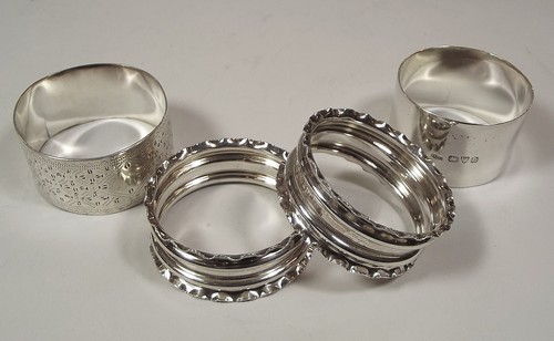 NAPKIN RINGS
A pair of late Victorian silver napkin rings & two other silver rings.