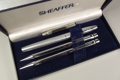 SHAEFFER
An American Shaeffer brushed stainless steel fountain pen & a matching Shaeffer Australia
